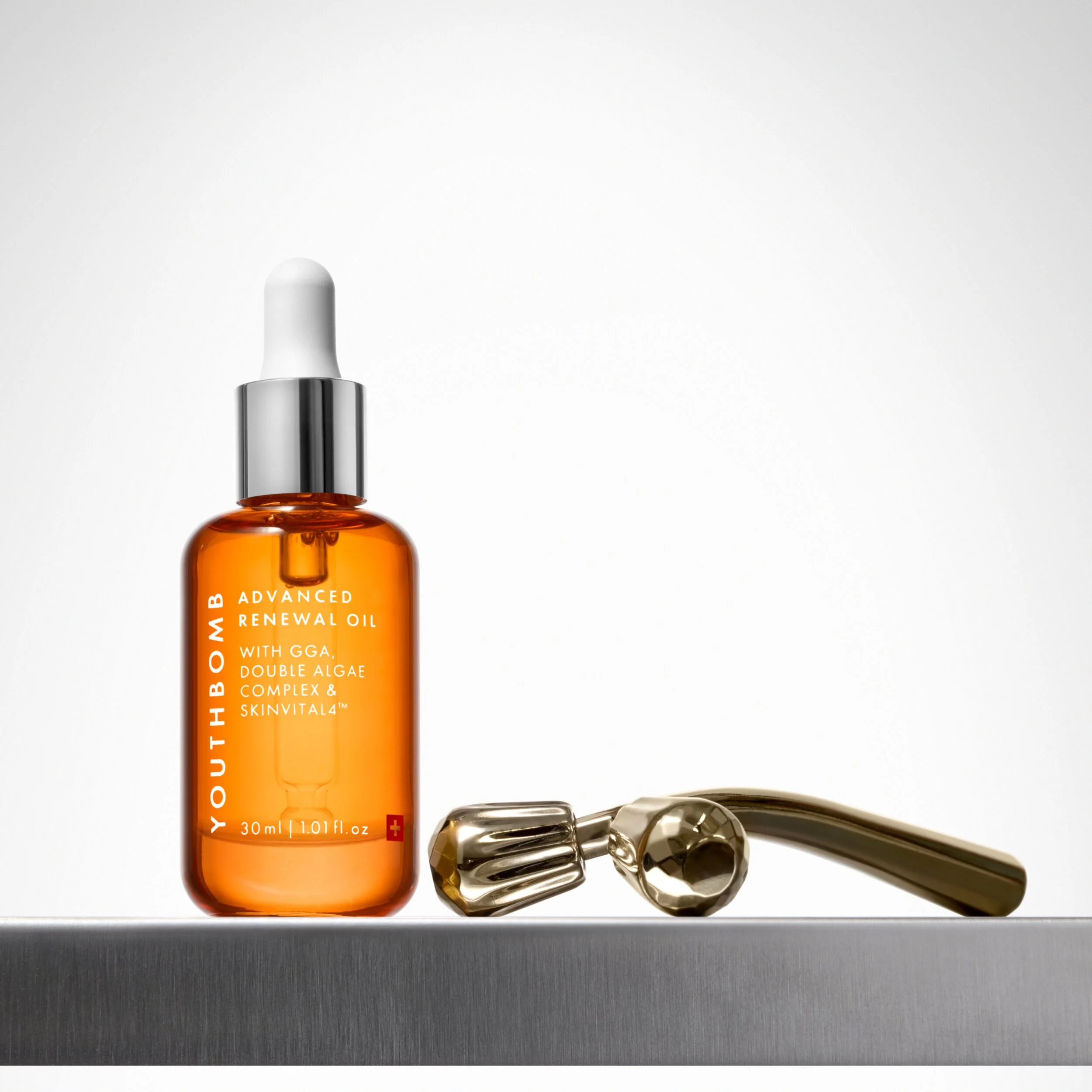 Youthbomb Sculpt and Glow Duo with Youth-Boosting Oil and Facial Roller