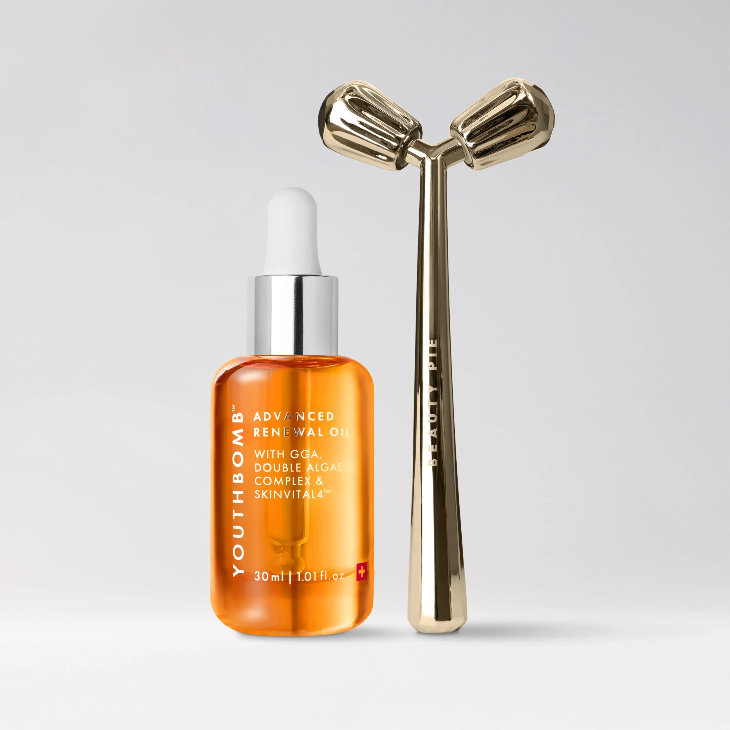 Youthbomb Sculpt and Glow Duo with Youth-Boosting Oil and Facial Roller